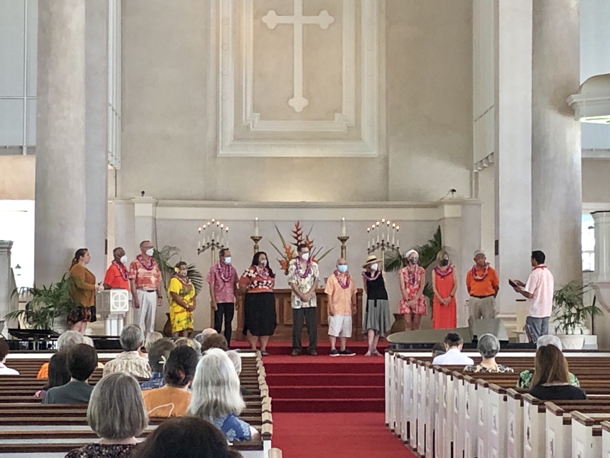 council members stand before the congregation to be installed during a Sunday morning service