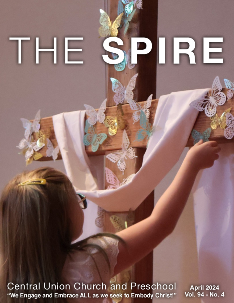 cover of Spire publication for April 2024 little girl putting butterflies on Easter cross in Parish Hall