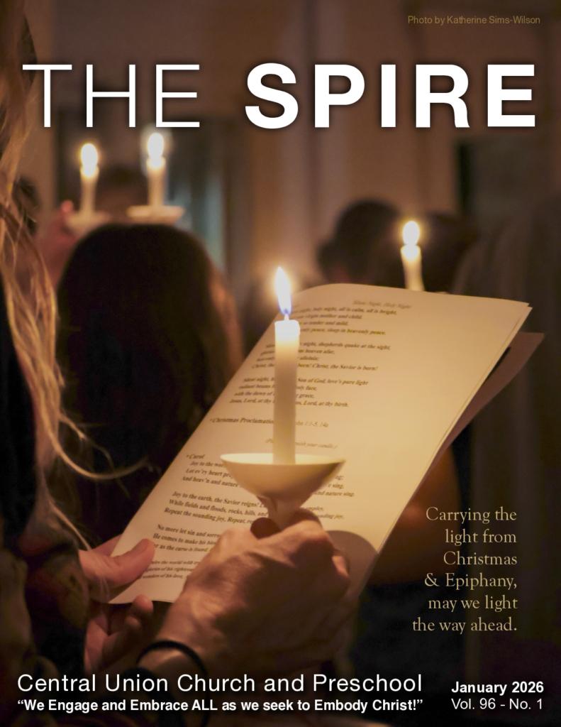 January 2026 Spire cover of candles lit at Christmas Eve service